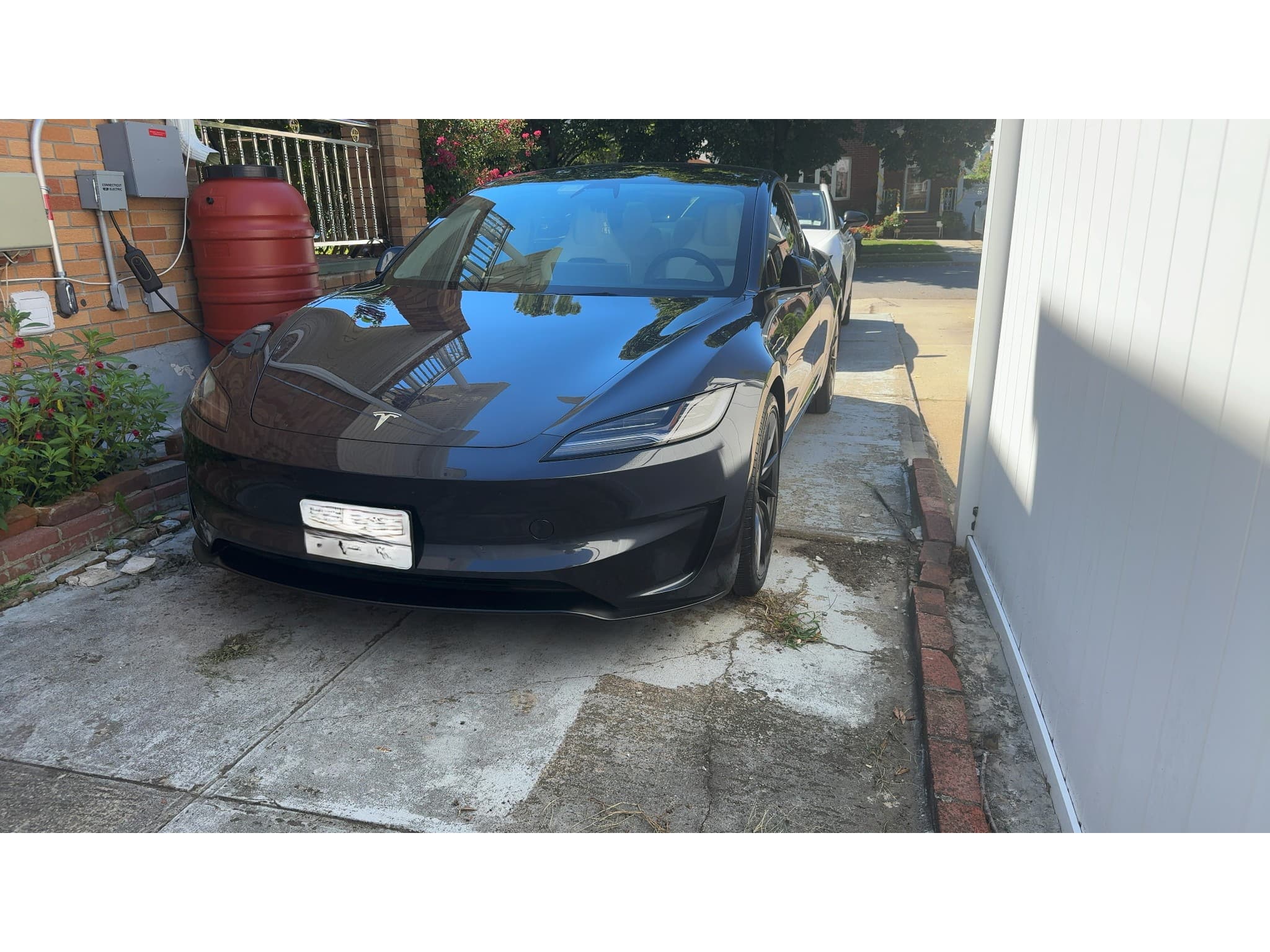 2025 Tesla Model 3 view 1