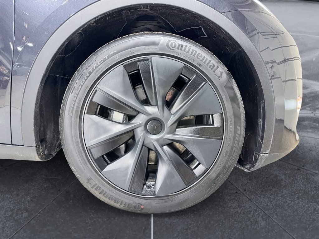 2025 Tesla Model Y view 34