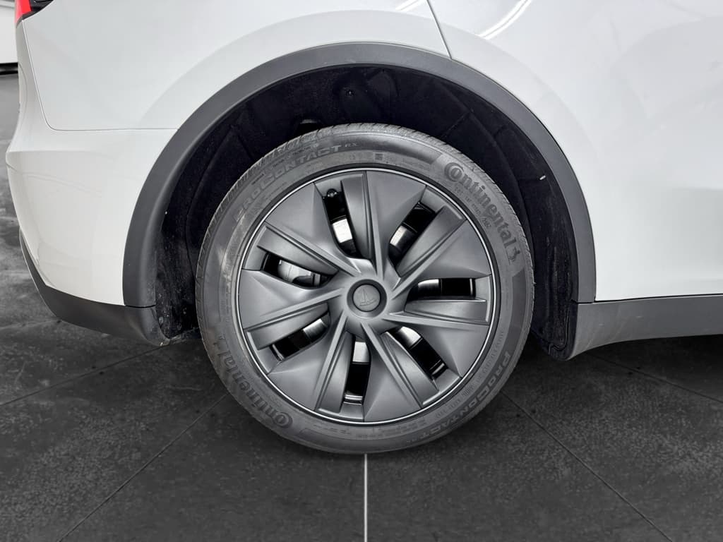 2025 Tesla Model Y view 34