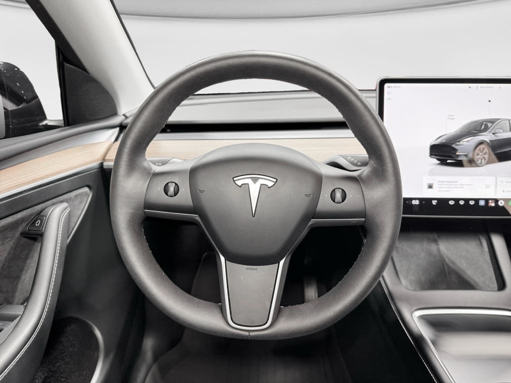 2025 Tesla Model Y view 8