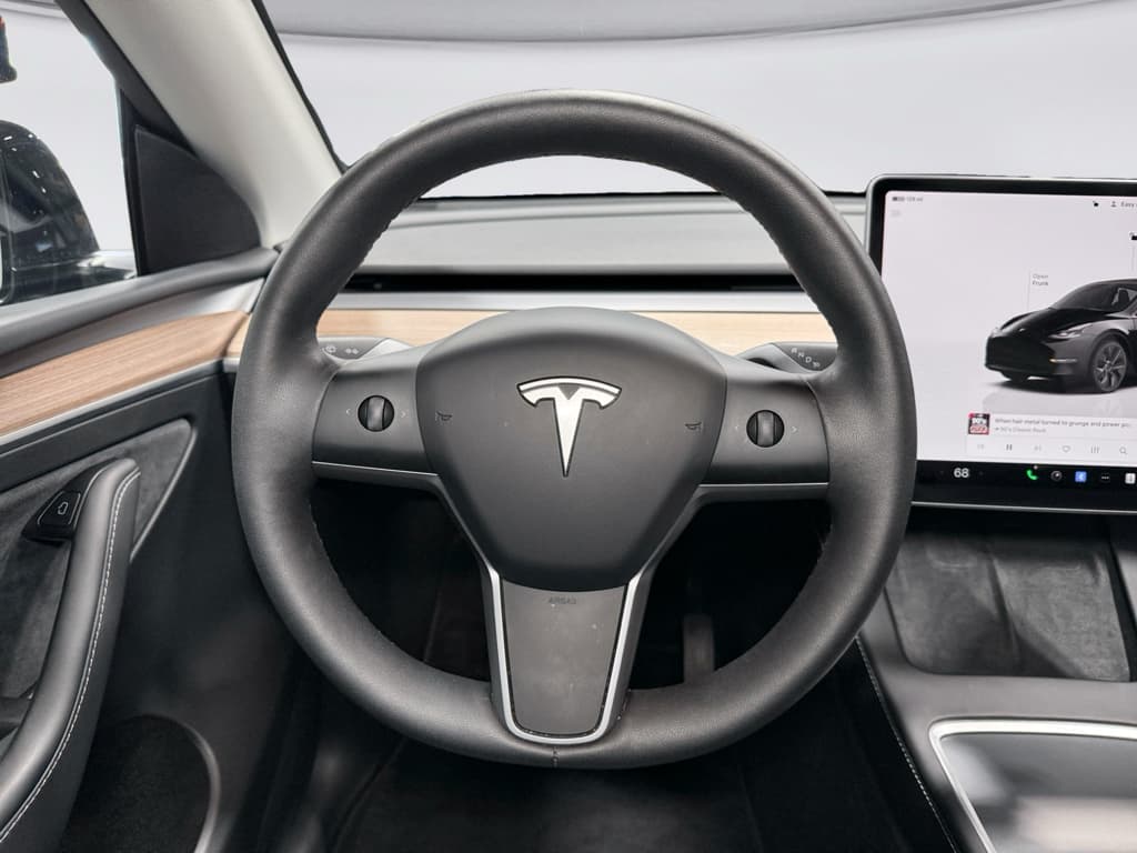 2025 Tesla Model Y view 7