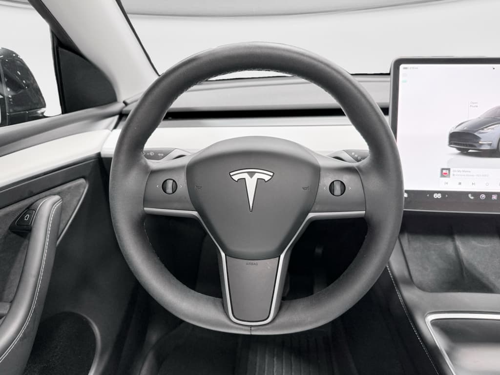 2025 Tesla Model Y view 7