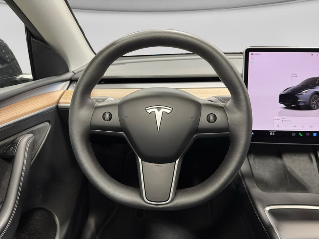 2025 Tesla Model Y view 8