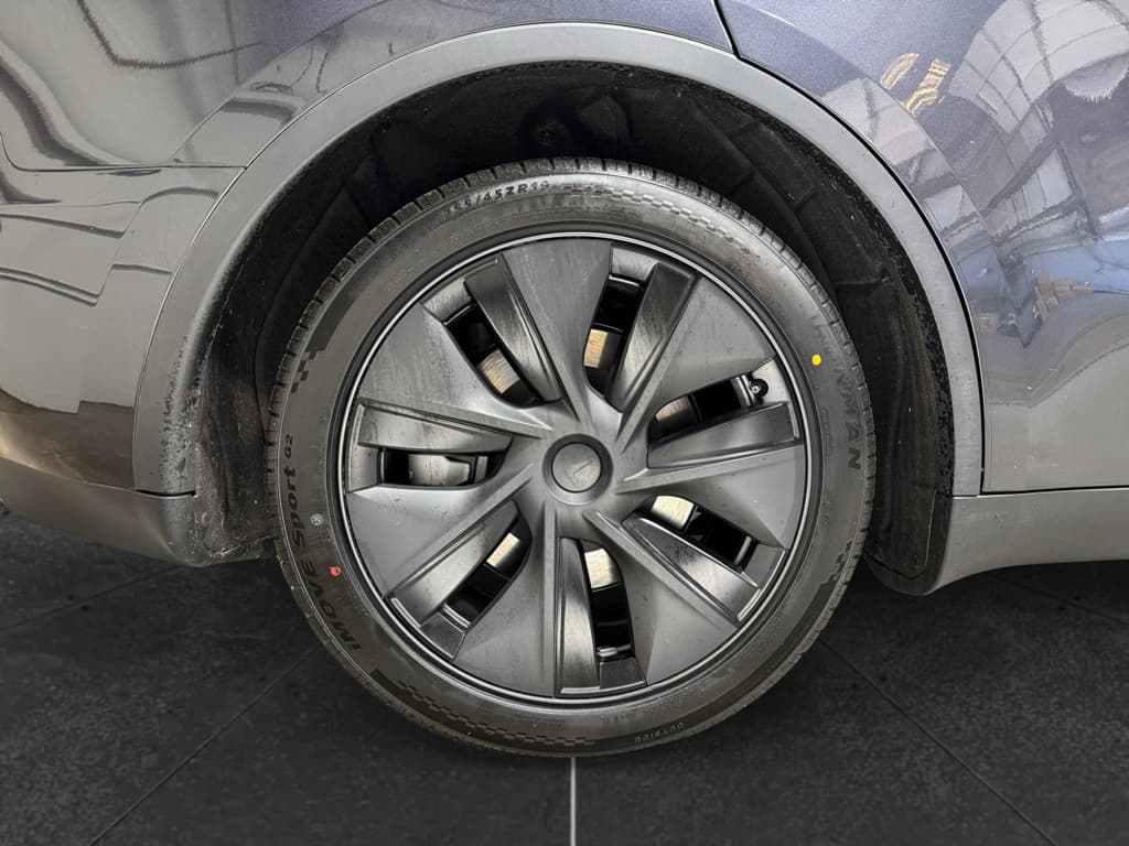 2025 Tesla Model Y view 34