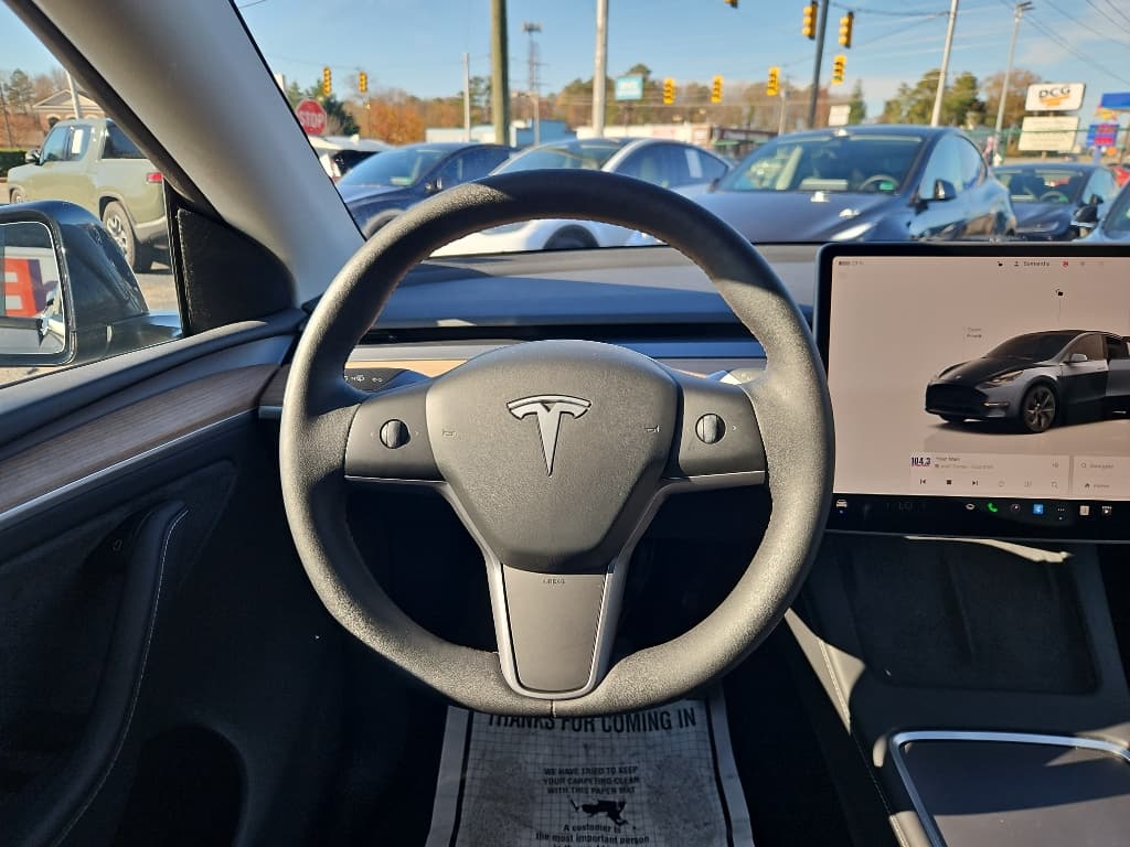 2025 Tesla Model Y view 8