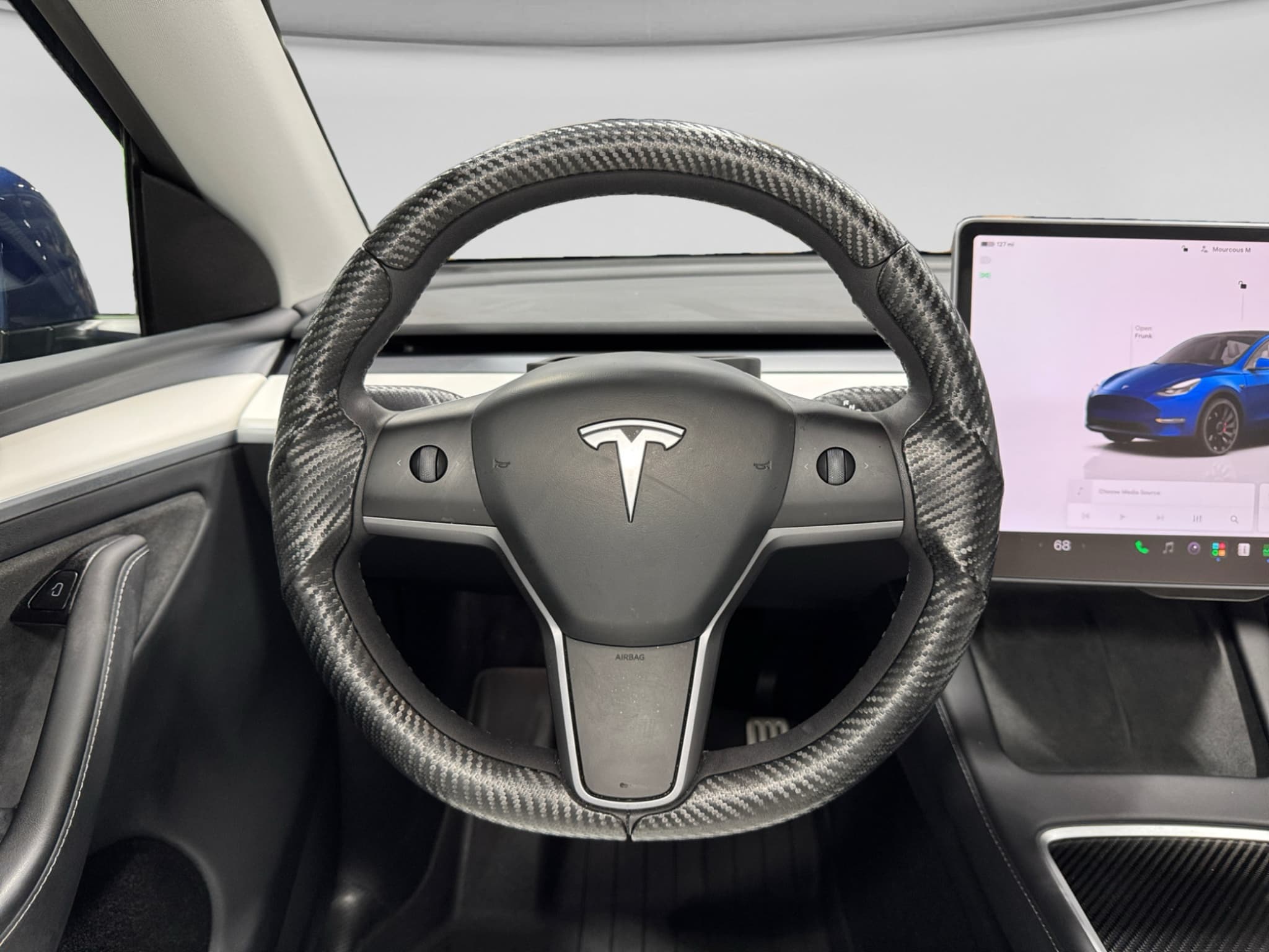 2025 Tesla Model Y view 9