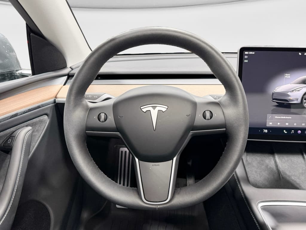 2025 Tesla Model Y view 7