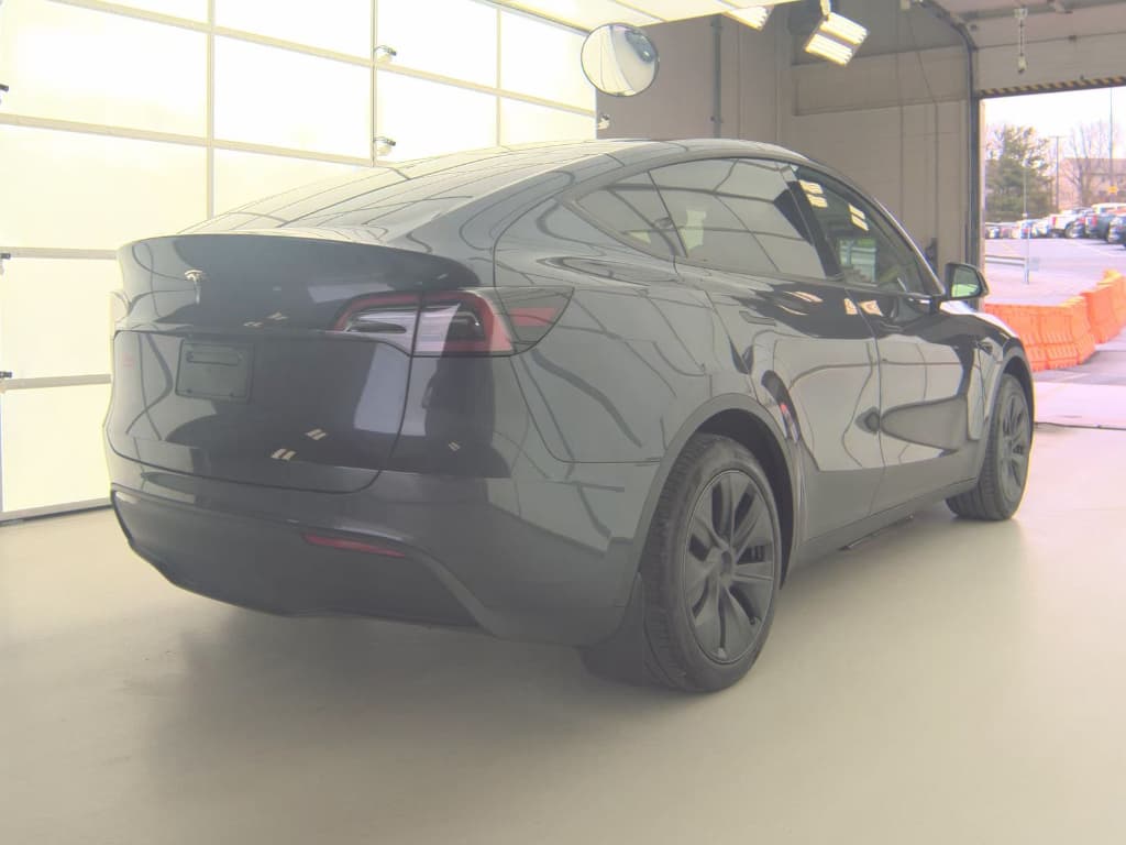 2025 Tesla Model Y view 3