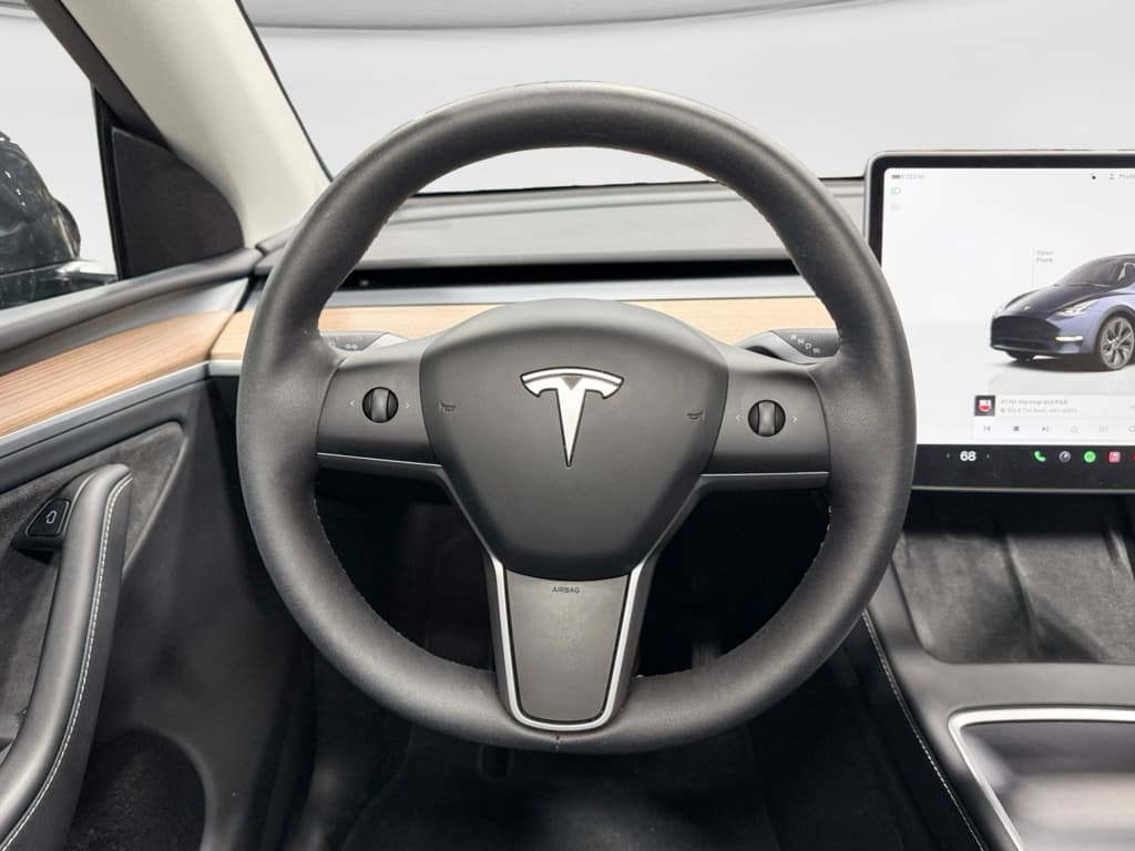 2025 Tesla Model Y view 7