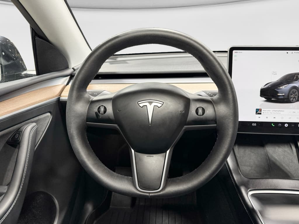 2025 Tesla Model Y view 7