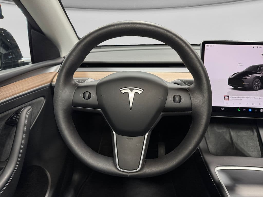 2025 Tesla Model Y view 5